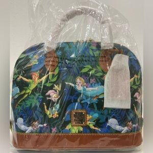 Brand new Disney Dooney and Bourke Peter Pan satchel new with tags.